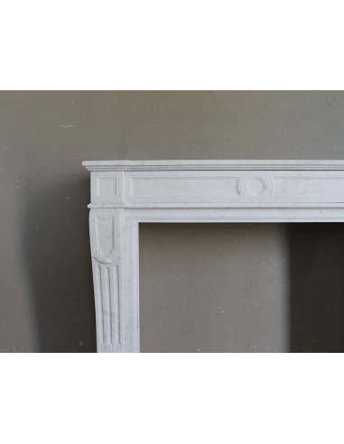 Antique neoclassical “Languette” fireplace mantel carved in top quality white Carrara marble.